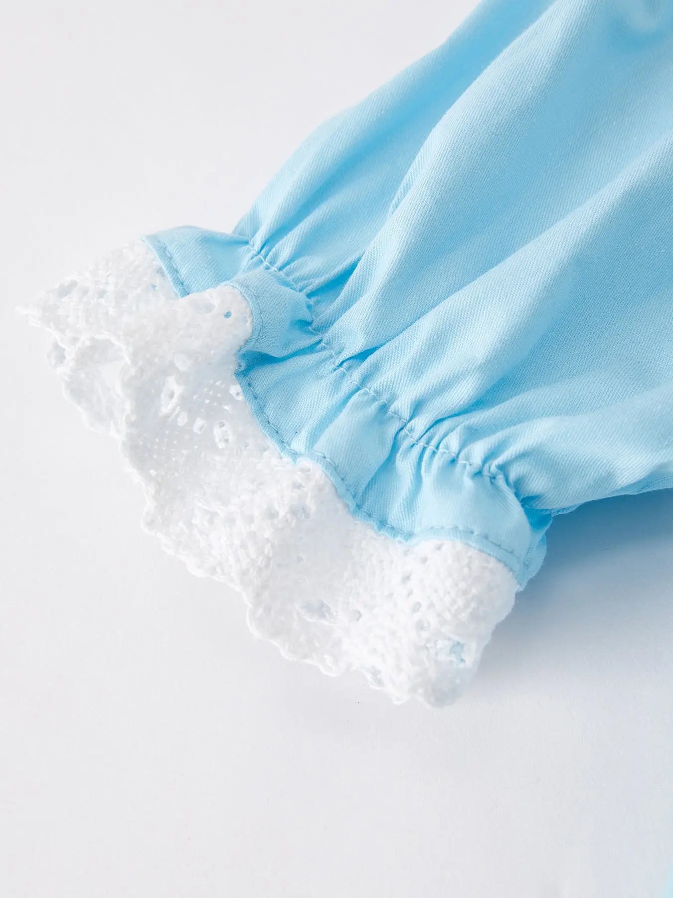 Girls Easter Bunny Smocking Embroidered Lace Cuff Blue Romper